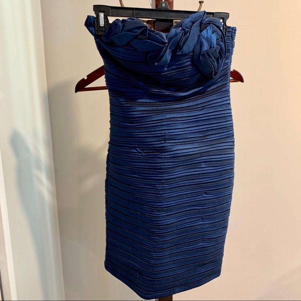 Blue strapless holiday party dress with rose